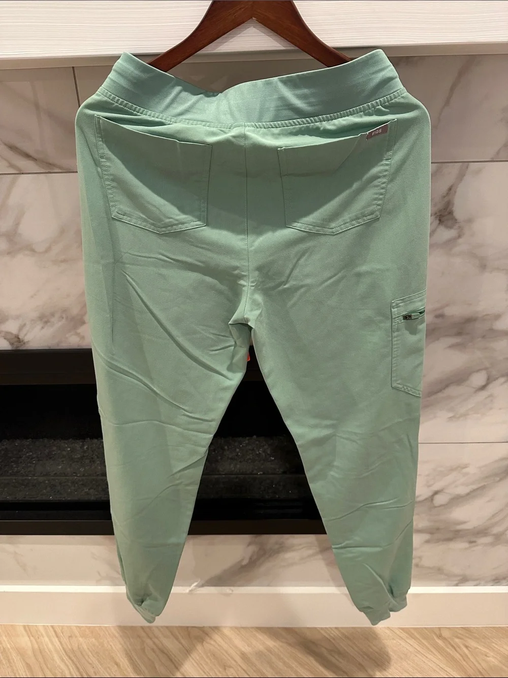 FIGS Women’s Mint Green Jogger Pants with Orange Drawstring